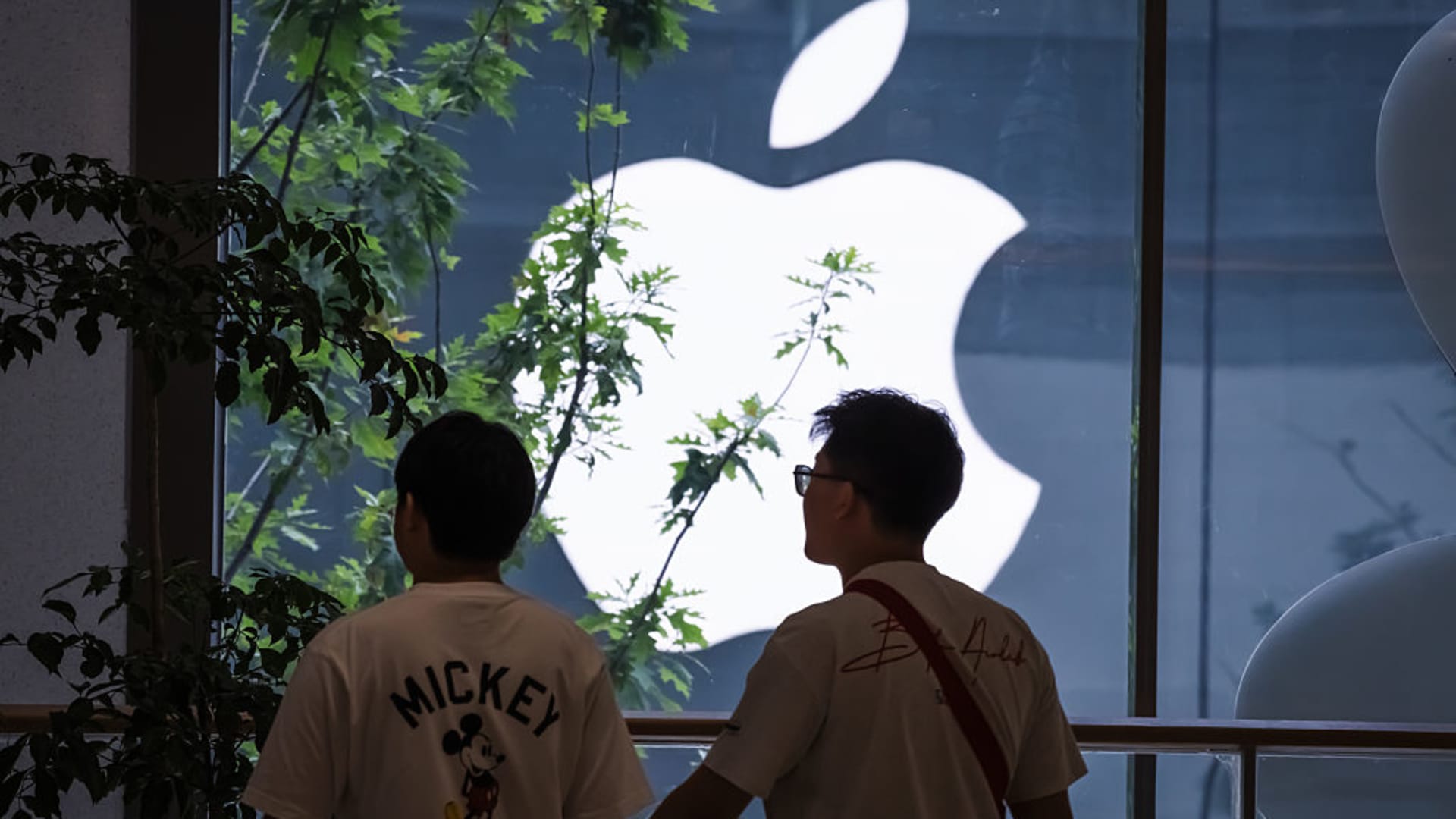 Apple shares reach record after China approval for AI features